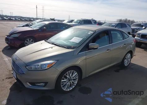 2015 Ford Focus Titanium из США, поврежденный, VIN 1FADP3J23FL373450
